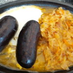 Black pudding sausages boiled in blood with braised cabbage and sour cream!