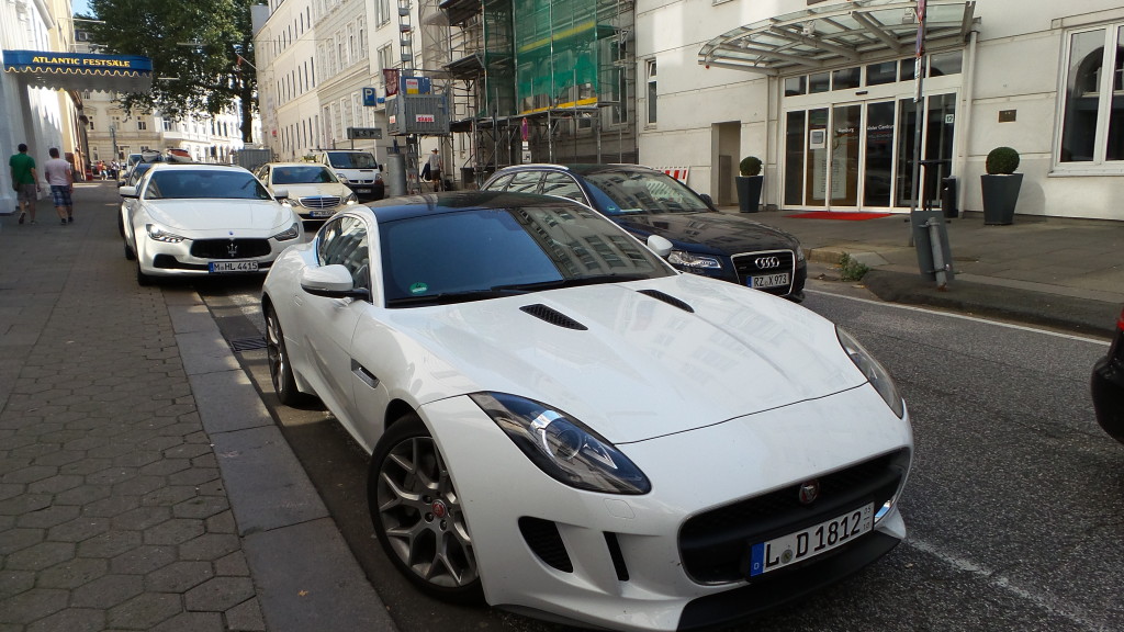 Rich German wheels: Jaguar, Maserati, Audi, Mecedes.