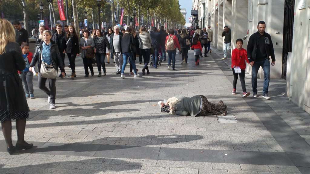 A beggar on the boulevard.