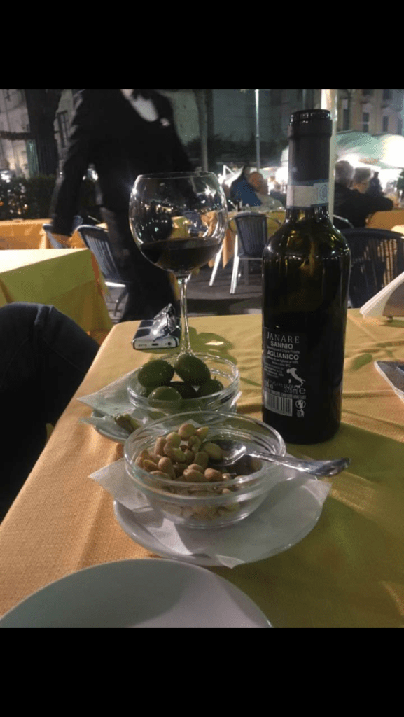 Fresh olives and wine.