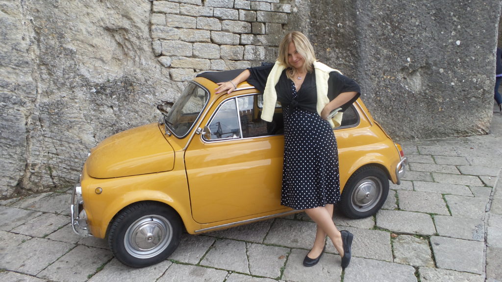 My very good friend Gosia and a tiny Italian car.